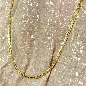 20” gold Givenchy chain.